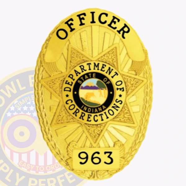 Close up of a custom metal badge in gold with safety pin attachment, designed for an officer in the Indiana Department of Corrections. The badge prominently displays "OFFICER" at the top, with "DEPARTMENT OF CORRECTIONS" encircling a central state emblem. The star-shaped design features intricate details, and the badge number "963" is shown at the bottom. The shiny gold finish enhances its authoritative presence, while the safety pin attachment allows for secure fastening to uniforms, making it both functional and eye-catching for law enforcement personnel.