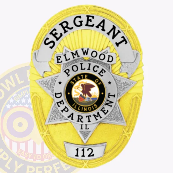 Oval gold metal badge customized for Elmwood police sergeant, highlighted by a detailed silver 7-point star at the center, black lettering on white ribbons including "SERGEANT," "ELMWOOD," and "POLICE DEPARTMENT IL," with identification number "112" at the base.