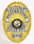 Gold oval custom metal badge designed for Westbrooke police lieutenant displaying a radiant gold background with white banners carrying the text LIEUTENANT, WESTBROOKE, POLICE DEPT., a central Maine state seal in black and gold, and the numeric ID 888 on a silver plaque near the bottom, attached with safety pin.
