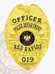 A vivid representation of a custom metal badge in gold with safety pin attachment, designed for law enforcement. The badge reads "OFFICER" and includes "POLICE DEPARTMENT," along with the state seal of Louisiana and identification as part of "RED RAPIDS" with badge number 019, making it an essential accessory for officers.