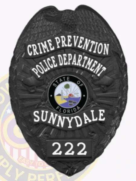 Black metal police badge for Sunnydale Crime Prevention featuring a finely detailed eagle on the upper part, bold white text CRIME PREVENTION and POLICE DEPARTMENT on curved banners, the State of Florida seal in vibrant colors centered, SUNNYDALE printed bold below it, and badge number 222 on a black plate at the bottom, attached using a safety pin.