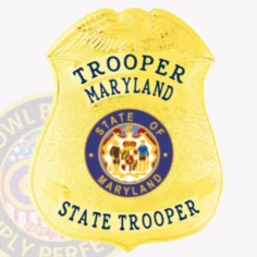 A vibrant custom badge in gold, shaped like a shield. The badge prominently features the word "trooper" at the top and "state trooper" at the bottom, both rendered in bold, dark letters. In the center, the maryland state seal is encircled by a blue ring, showcasing two soldiers and a coat of arms. The polished gold surface gleams, adding an air of distinction, making this custom badge in gold an excellent symbol of law enforcement pride and authority.