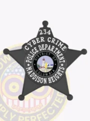 Black custom metal badge for Madison Heights Police Cyber Crime, five-point star design with white lettering on circular banner and the District of Columbia seal at the center, finished with safety pin fastening.
