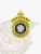 Five-point star silver metal badge with gold panels for Madison Heights Police Sergeant, showing bold black text on a yellow circular banner around the District of Columbia seal, attached with safety pin.