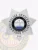 Custom silver metal 7 point star badge for Oakridge police officer, highlighted by ornate engraving on the star points, black text labels including "POLICE OFFICER," "OAKRIDGE POLICE," and badge number "556," surrounding the official Tennessee seal, with a safety pin attachment.