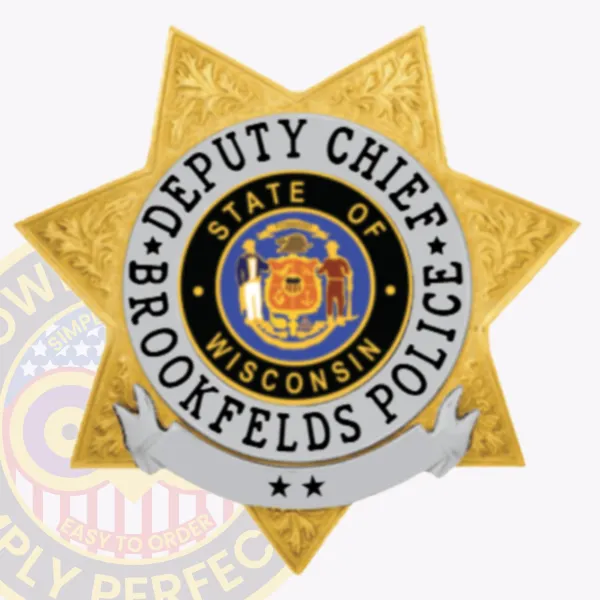 Brookfields Police Deputy Chief custom gold 7 point star metal badge, highlighting embossed floral designs on star points, a circular medallion with the Wisconsin state emblem, and the title "DEPUTY CHIEF BROOKFIELDS POLICE" around it, attached with a safety pin.