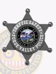 Custom black metal badge shaped as a six-point star for Forge Valley Police Traffic Safety, showing the South Dakota state seal in the center, encircled by white text on a black background, finished with a safety pin attachment.
