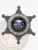 Custom black metal badge shaped as a six-point star for Forge Valley Police Traffic Safety, showing the South Dakota state seal in the center, encircled by white text on a black background, finished with a safety pin attachment.