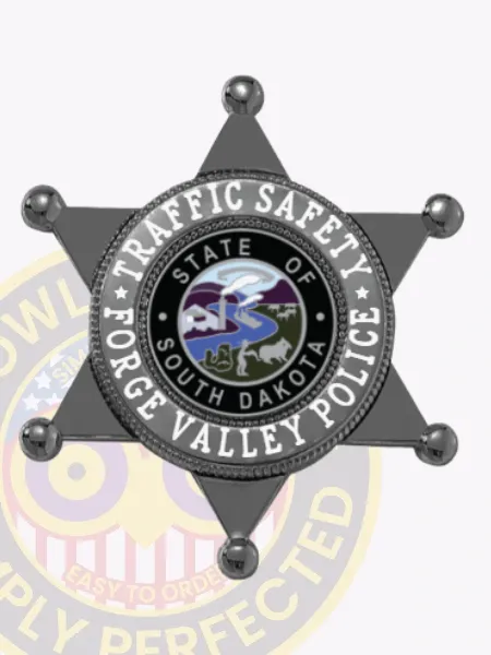 Custom black metal badge shaped as a six-point star for Forge Valley Police Traffic Safety, showing the South Dakota state seal in the center, encircled by white text on a black background, finished with a safety pin attachment.
