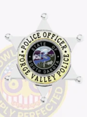 Six-point star silver metal badge for Forge Valley Police Officer, containing the detailed South Dakota state seal at the center, bordered by black text on white reading “Police Officer” and “Forge Valley Police,” featuring a safety pin attachment.