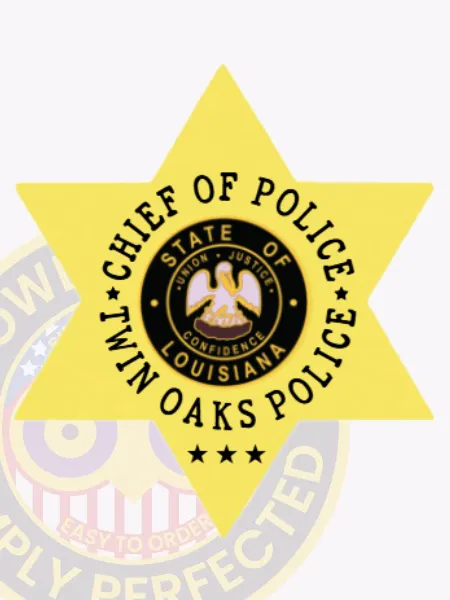 Polished gold six-point star badge custom-made for Twin Oaks Police Chief of Police, highlighting the Louisiana state seal at the center with clear black text around it, accented by three black stars below, attached with a safety pin for secure wear.