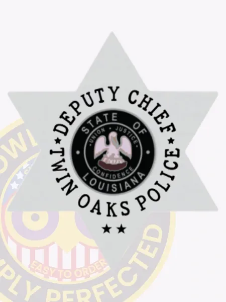 Six-point star silver metal badge for Twin Oaks Police Deputy Chief, containing the detailed Louisiana state seal in the center, bordered by black text that reads “Deputy Chief” and “Twin Oaks Police,” featuring a safety pin attachment.
