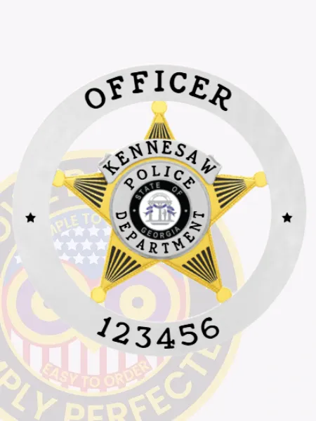 Five-point gold star badge encased in a silver circular banner that says "Officer 123456 Kennesaw Police Department" in black font, with the State of Georgia seal prominently displayed in the middle, designed for safety pin attachment.