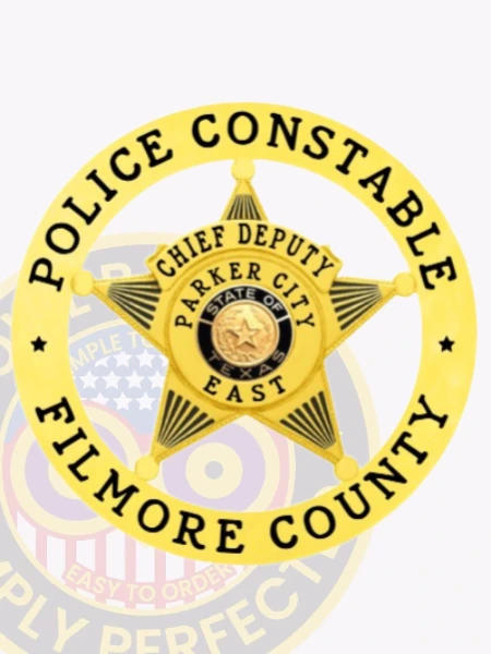 An eye-catching custom metal badge in gold color features an intricate star design at its core, surrounded by the inscriptions "POLICE CONSTABLE" and "FILMORE COUNTY." The badge highlights "CHIEF DEPUTY," "PARKER CITY EAST," and the state seal of Texas, equipped with a safety pin attachment for practical use.