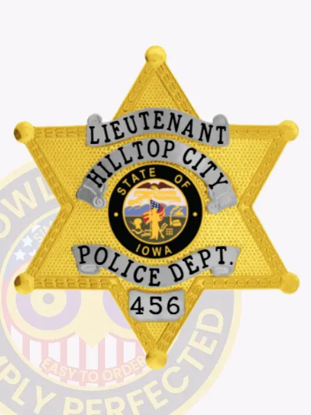 Gold custom 6 point star badge made for Hilltop City police lieutenant showing black text on silver banners, a central colored seal of the State of Iowa, and a safety pin fastener on the reverse side.