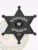 Black 6 point star metal badge for Brookside PD Bayou Patrol, displaying white lettering around the Louisiana state emblem in the center, with “BAYOU PATROL” on a curved plate at the top, “BROOKSIDE PD” below, and badge number “123,” embossed leaf designs, and rounded star points.