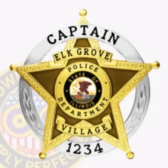 Elk grove village police captain badge composed of a gold star inside a silver circular panel, with prominent black lettering for rank and location, and badge number "1234" displayed clearly, secured by safety pin attachment.