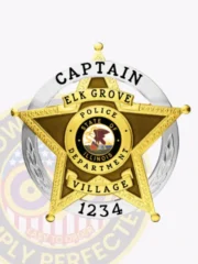 Custom metal badge designed for Elk Grove Village Police Captain, combining a gold five-point star and silver circle panel, featuring black text "CAPTAIN," "ELK GROVE VILLAGE," and the badge number "1234," attached using a safety pin.