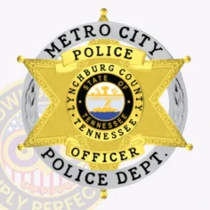 Six-point gold star metal badge for metro city police officer, framed by a textured silver circle bearing bold black text "metro city police dept. ," with yellow ribbon banners reading "police" and "officer" across the star, showcasing the tennessee state seal in the center, designed with a safety pin fastener.