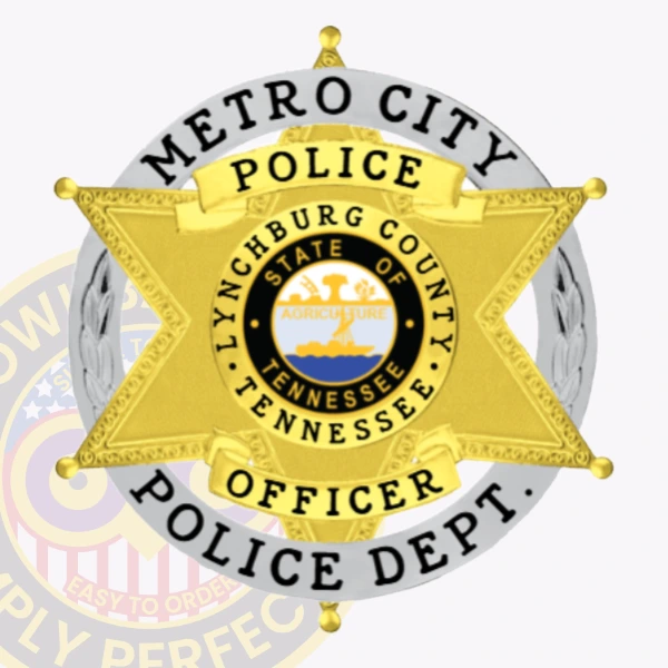 Six-point gold star metal badge for Metro City Police Officer, framed by a textured silver circle bearing bold black text "METRO CITY POLICE DEPT.," with yellow ribbon banners reading "POLICE" and "OFFICER" across the star, showcasing the Tennessee state seal in the center, designed with a safety pin fastener.