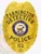 Highlighted is a custom metal badge in a radiant gold finish, showcasing the text "DETECTIVE POLICE" along with the emblem of the State of Maine. The safety pin attachment provides reliable security, making this badge ideal for law enforcement officials who require a stylish identification solution.