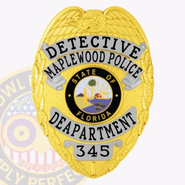 Featuring a custom metal badge in gold color, this image captures the title "Detective Maplewood Police Department" accented by silver panels. The badge's sophisticated design includes a central state emblem and comes with a safety pin attachment for effortless wearing.