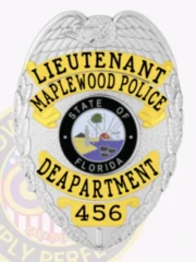 A custom metal badge in silver color is depicted here, featuring elegant gold panels that read "Lieutenant Maplewood Police Department." The badge showcases a detailed state emblem and comes with a reliable safety pin attachment for easy application.
