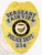 Gold metal badge for Fairview Police Sergeant showing a large eagle emblem at the top, black text on silver banners reading “SERGEANT FAIRVIEW POLICE DEPT.,” centered Oregon state seal, with “234” displayed prominently and a safety pin on the back for attachment.