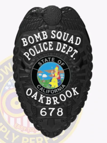 Oakbrook Police Bomb Squad custom black metal badge displaying an eagle emblem on top, bold white lettering around the California state seal, labeled “BOMB SQUAD POLICE DEPT. OAKBROOK,” with badge number “678” and safety pin fastener.