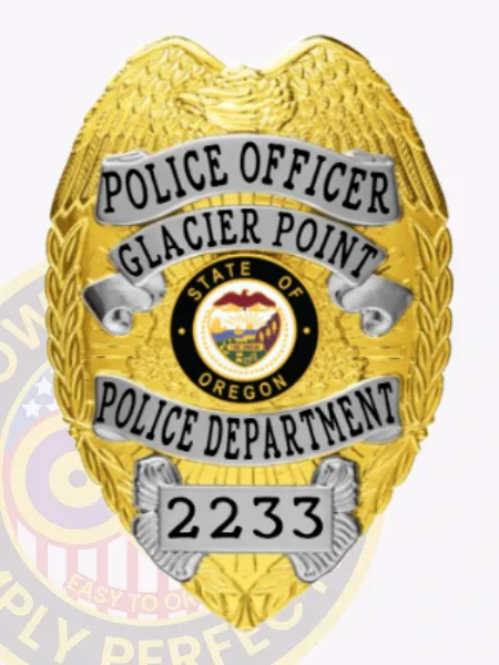 This custom metal badge in a gold color with sleek silver panels, displays "POLICE OFFICER GLACIER POINT POLICE DEPARTMENT" boldly at the top. The badge features the Oregon state seal and is equipped with a safety pin attachment for ease of use.