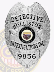 A custom metal badge glimmering in silver is presented here, showcasing "DETECTIVE" and the identification number "9856." The safety pin attachment allows for easy and secure wear, making it perfect for professionals looking to project authority effectively.
