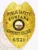 This custom metal badge in gold color with a safety pin attachment prominently displays "PUBLIC SAFETY," "FONTANA," and "COMMUNITY COLLEGE." The badge features a vibrant central emblem showcasing the New Hampshire state seal, surrounded by intricate golden detailing that signifies authority.