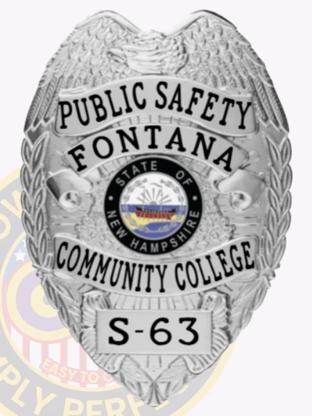 A striking custom metal badge in silver color with a safety pin attachment highlights the titles "PUBLIC SAFETY" and "FONTANA." The design includes a colorful depiction of the New Hampshire state seal at the center, framed by elegant silver accents.