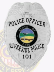 Riverside Police Officer custom silver metal badge showcasing an eagle with spread wings atop the shield, silver banners with black text highlighting rank and department, centered around a multicolor Ohio state seal, finished with badge number "101" and a safety pin fastener.