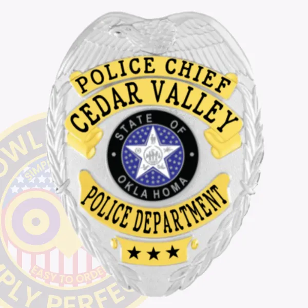 This image illustrates a custom metal badge in silver with gold panels, prominently featuring "Police Chief Cedar Valley" along with "Police Department." The badge is designed with a detailed state emblem and features a safety pin attachment for effortless fastening.