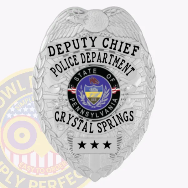 Featuring a custom metal badge in silver, this image captures the title "Deputy Chief Police Department, Crystal Springs." The badge’s sophisticated design includes a central Pennsylvania state emblem and comes with a safety pin attachment for secure display on uniforms.