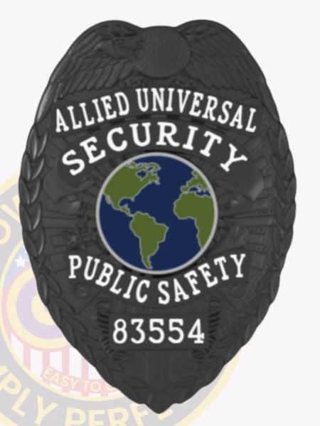 Stylish black metal badge showcasing the words "ALLIED UNIVERSAL SECURITY PUBLIC SAFETY" above a circular globe design. The safety pin attachment ensures it remains securely in place, making it ideal for uniform wear. This custom metal badge in black color with safety pin attachment reflects authority and vigilance in the security field.