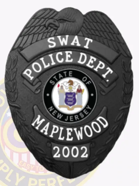 Maplewood Police custom black metal badge for SWAT, showing an eagle figure above white text bands with "SWAT," "POLICE DEPT.," and "MAPLEWOOD," encircling the New Jersey state seal, designed with a safety pin attachment.