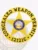 Highlighted is a custom metal badge with a polished gold finish, designed with a circular border that enhances its visibility. The badge features a safety pin attachment, ensuring secure fastening for individuals needing to present their weapon permit credentials confidently.