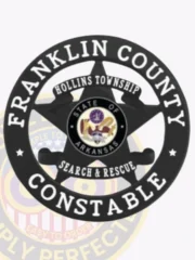 A stylish custom metal badge in black color showcases a prominent star motif encircled by the text "FRANKLIN COUNTY" and "CONSTABLE." The center features the Arkansas state emblem and the inscription "SEARCH & RESCUE," making it a distinctive piece, complete with a safety pin attachment for easy fastening.