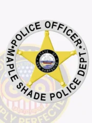 Detailed custom gold metal badge shaped as a 5 point star within a silver circular banner for Maple Shade Police Officer, labeled "POLICE OFFICER" on top and "MAPLE SHADE POLICE DEPT." on bottom in bold black font, center displaying the New Hampshire state police seal and department name, equipped with a safety pin attachment.