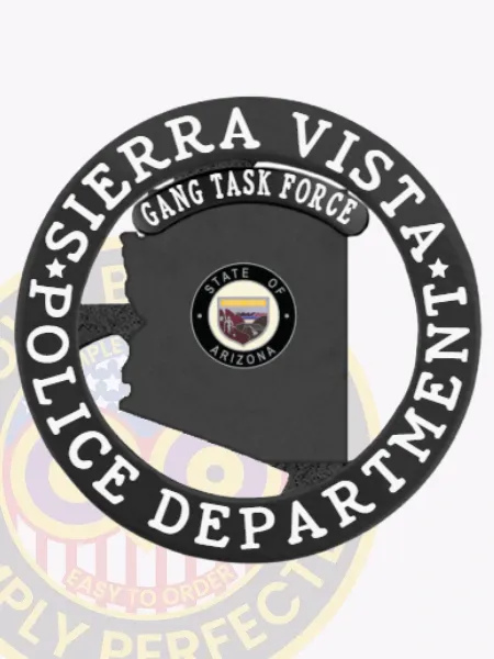 Black Arizona state metal badge for Sierra Vista Police Gang Task Force, featuring the state seal inside the silhouette, encircled by a bold black ring with white “Sierra Vista Police Department” text, and a black “Gang Task Force” label above, attached with a safety pin.