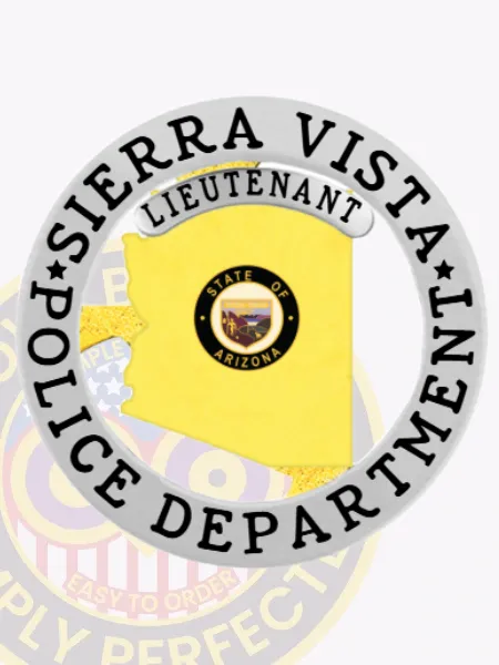 Gold Arizona state metal badge for Sierra Vista Police Lieutenant, featuring the state seal in the middle of a gold silhouette, surrounded by a shiny silver circle with bold black text reading “Sierra Vista Police Department,” and a silver “Lieutenant” tag above, attached with a safety pin.
