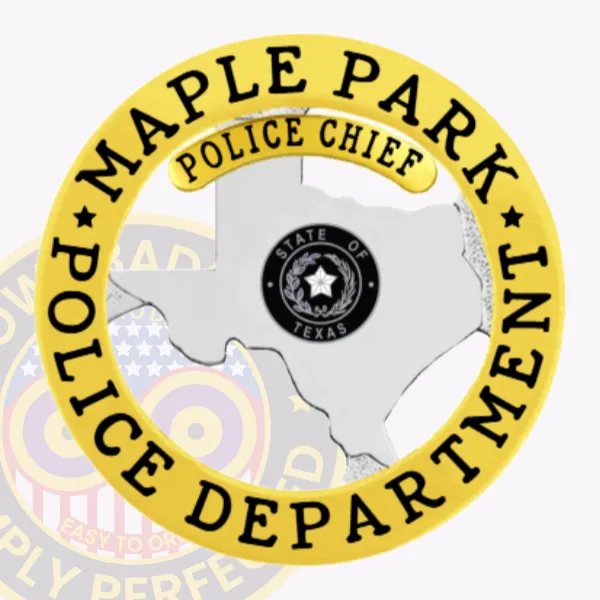 Custom silver metal badge shaped like Texas for Maple Park Police Chief, showing the Texas state seal within the silver outline, bordered by a gold circular banner reading “Maple Park Police Department” in black letters, with a gold “Police Chief” label on top, secured with a safety pin closure.