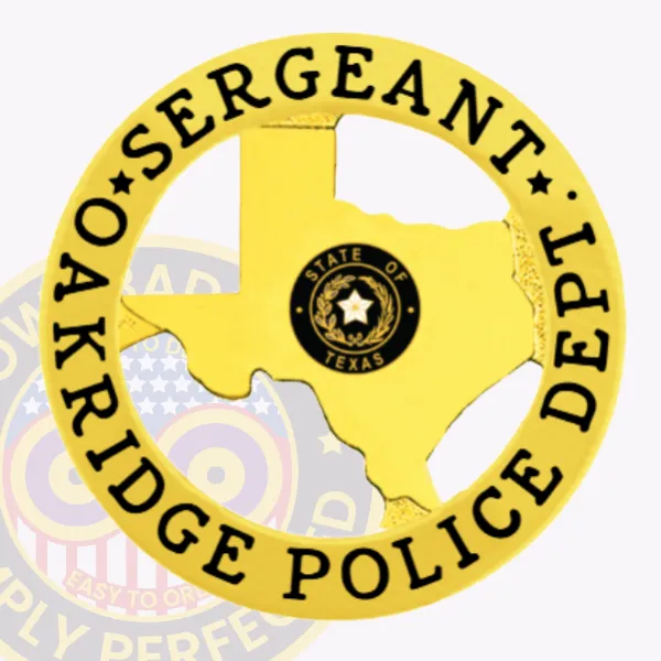 Polished gold Texas state metal badge custom-made for Oakridge Police Sergeant, highlighting the Texas state seal at the center within the gold silhouette, surrounded by a gold circular banner containing black text “Sergeant” and “Oakridge Police Dept,” attached with a safety pin.
