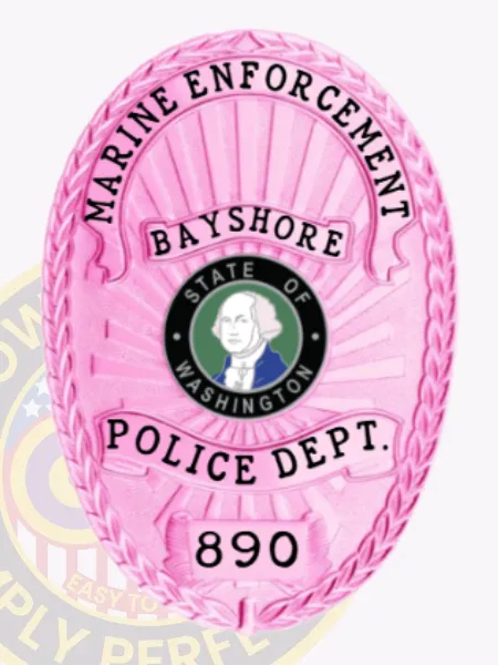Bright pink custom BCAM oval metal badge designed for Bayshore Police Marine Enforcement, displaying a classic laurel wreath border, black lettering of "MARINE ENFORCEMENT," "BAYSHORE," and "POLICE DEPT.," along with the number "890" at the base, centered around a circular State of Washington emblem.