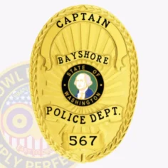 Contemporary Oval Badge Shield With Background Rays, 4 Ribbon Text Panels, Reef Border 9 Custom gold oval metal badge for bayshore police the captain with safety pin attachment, featuring a bright gold finish with a raised laurel wreath border, black text reading "captain," "bayshore," "police dept. ," and badge number "567," with a state of washington emblem in the center.