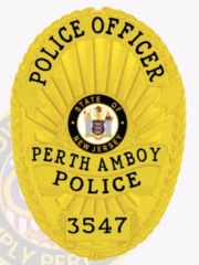 A custom police badge in all gold color, prominently featuring the title "POLICE OFFICER" at the top. The badge showcases the emblem for the "STATE OF NEW JERSEY" in the center, surrounded by the text "PERTH AMBOY POLICE" and the badge number "3547" at the bottom. Its shiny gold finish highlights its official and authoritative design.