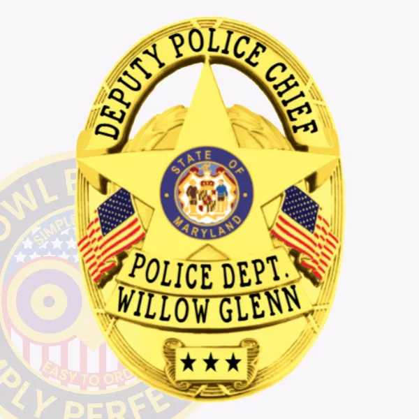 This impressive custom metal badge in gold highlights a unique star shape with detailed engraving. The top section reads "DEPUTY POLICE CHIEF" in prominent black lettering. Centrally located is the Maryland state seal, framed by "POLICE DEPT." and "WILLOW GLENN." At the bottom, three stars are clearly displayed. A durable safety pin attachment allows for easy and secure wear of the badge.