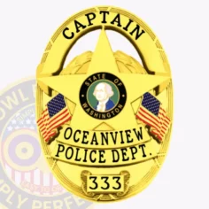 Custom gold oval metal badge for oceanview police captain featuring a prominent five-point star in the center with the state of washington seal, black text captain arched at the top, oceanview police dept. On a banner below the star, badge number 333 on a scroll at the bottom, and two american flags on each side, secured with a safety pin attachment.